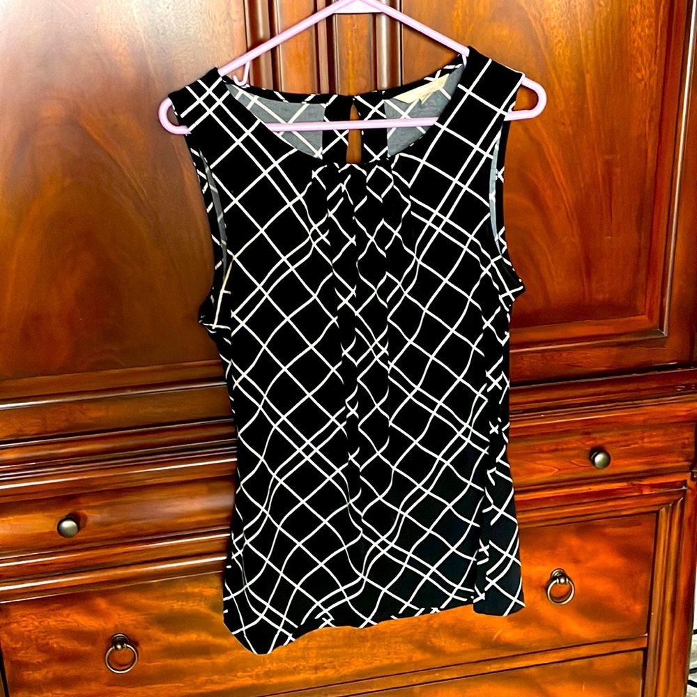 Black and white white white sleeveless Banana Republic work shirt